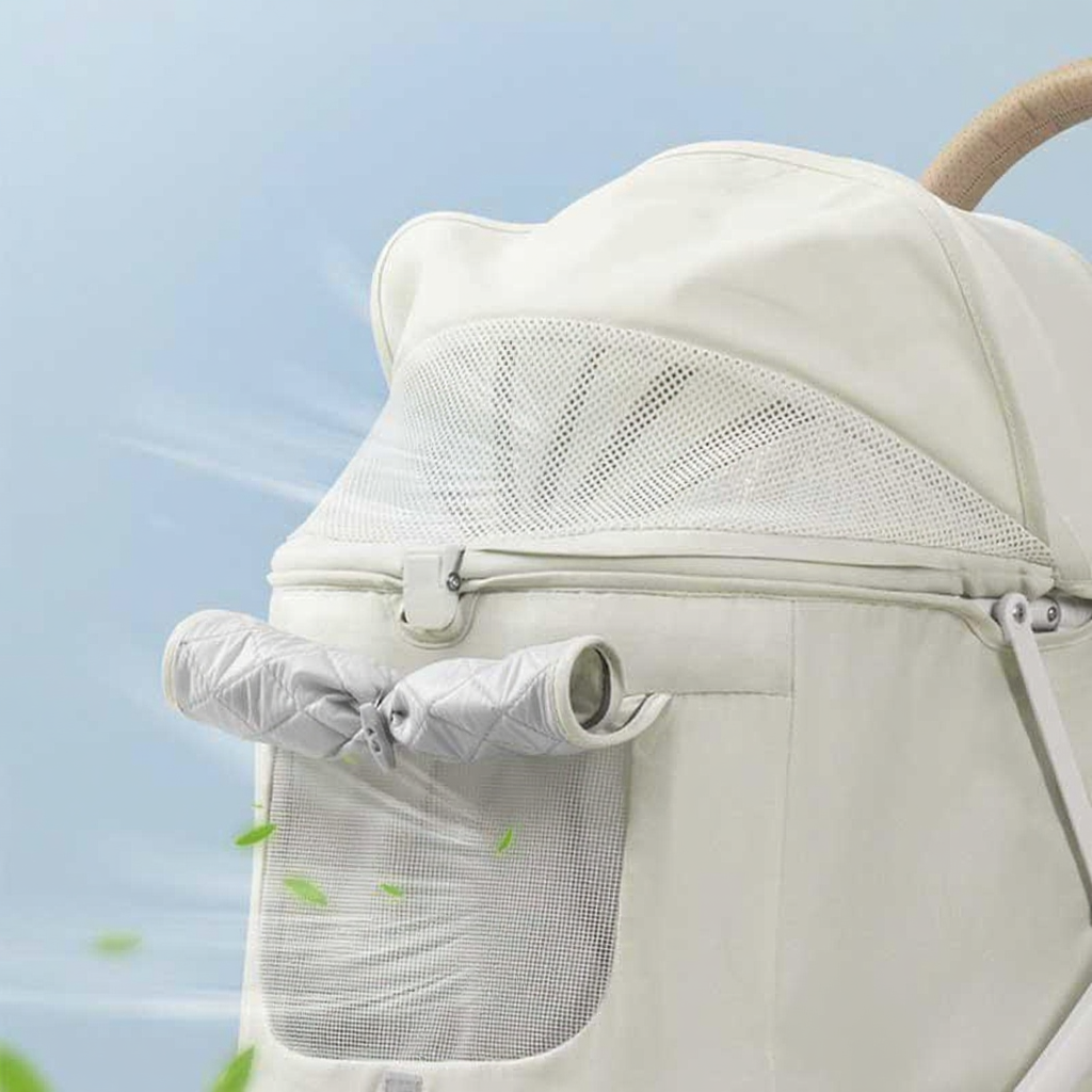 Catvera Bow Pet Stroller Carrier - Image 12|||PROMPT|||Cleaned image. Original analysis: Found 1 brand name label on the product - 'TooDanDon' logo/text visible on a label patch on the lower right area of the stroller
