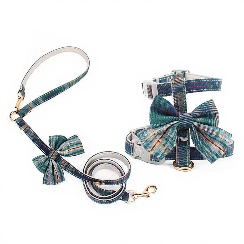 Catvera Bow Tie Cat Harness - Image 8|||PROMPT|||Cleaned image. Original analysis: Found brand name 'WOUAPY' (or similar) stitched/embossed on the collar hardware and buckle areas of both the leash and harness set