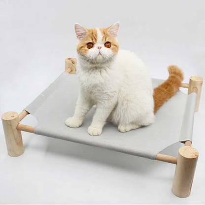 Catvera Elevated Summer Cat Hammock - Image 14|||PROMPT|||Cleaned image. Original analysis: found text 'CATTY' printed on the fabric/canvas material of the cat bed in multiple locations