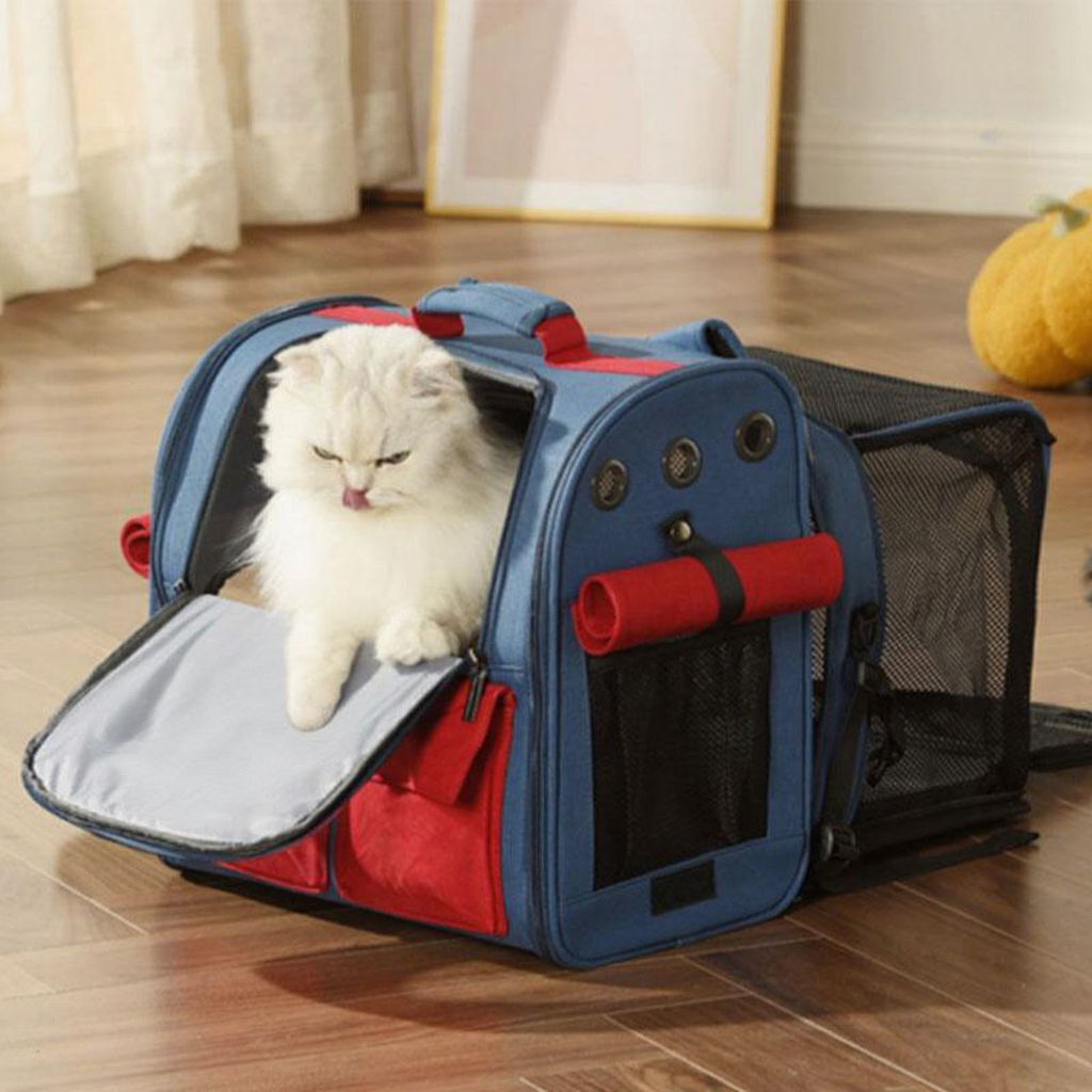 Catvera Expandable Canvas Cat Carrier Backpack - Image 19|||PROMPT|||Cleaned image. Original analysis: Found a Coca-Cola logo/branding visible on what appears to be a water bowl or food dish inside the pet carrier backpack