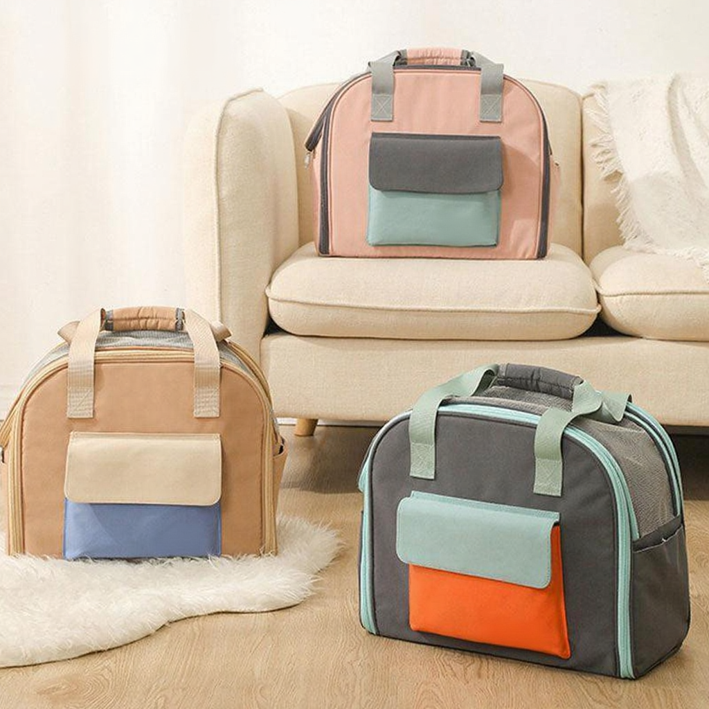 Catvera Expandable Foldable Cat Carrier Tote - Image 4|||PROMPT|||Cleaned image. Original analysis: Found multiple brand name logos on the bags themselves - 'LAND' or similar branding visible on the fabric patches of all three bags, plus a watermark text in the top left corner of the image