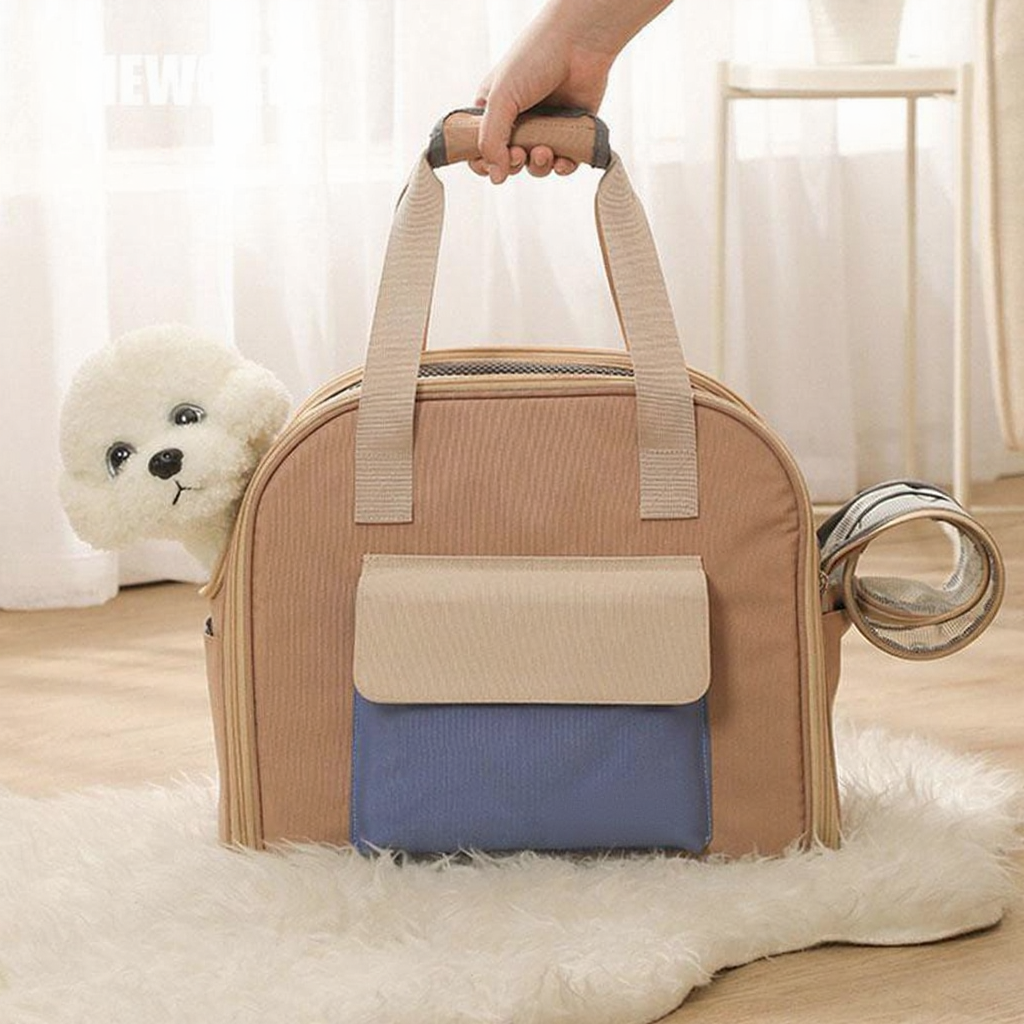 Catvera Expandable Foldable Cat Carrier Tote - Image 5|||PROMPT|||Cleaned image. Original analysis: Found 1 brand name printed on the product: 'FluffyBaby' label visible on the front pocket of the bag