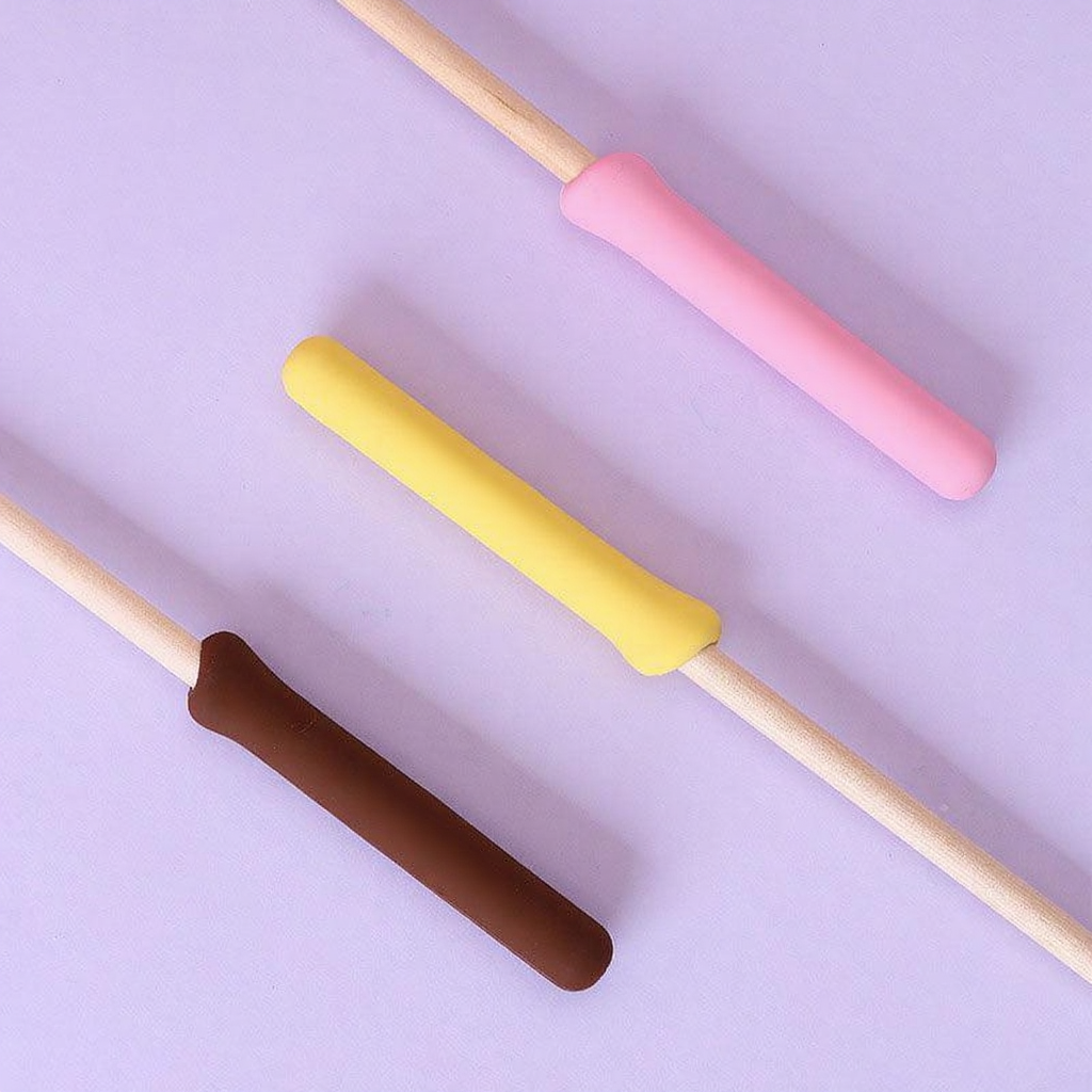 Catvera Feather Bell Catnip Wand - Image 9|||PROMPT|||Cleaned image. Original analysis: Found brand name/logo embossed or printed on each of the three utensil handles