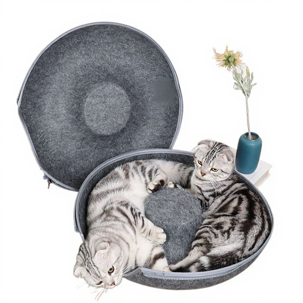 Catvera Foldable Felt Cat Tunnel Bed - Image 4|||PROMPT|||Cleaned image. Original analysis: Found 1 brand logo/watermark on the product - a white triangular logo visible on the upper right side of the gray felt cat bed/carrier