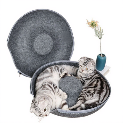 Catvera Foldable Felt Cat Tunnel Bed - Image 4|||PROMPT|||Cleaned image. Original analysis: Found 1 brand logo/watermark on the product - a white triangular logo visible on the upper right side of the gray felt cat bed/carrier