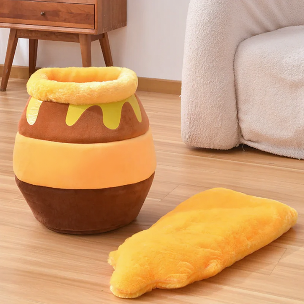 Catvera Honey Jar Cat Tunnel - Image 3|||PROMPT|||Cleaned image. Original analysis: Found 1 brand name printed directly on the product - 'HUNNY' text displayed on the honey pot plush toy
