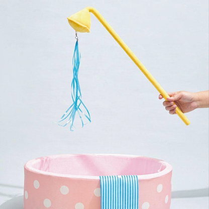 Catvera Japanese Hot Spring Cat Bed - Image 15|||PROMPT|||Cleaned image. Original analysis: Found 1 brand name printed on the yellow rod/pole of the cat teaser toy