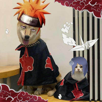 Catvera Naruto Anime Cat Cosplay Cape - Image 11|||PROMPT|||Cleaned image. Original analysis: Found Naruto anime branding elements including the red circular kanji logo at top, character design elements (Naruto and Konan cosplay), and anime-specific decorative elements (clouds, paper cranes). While these are thematic to the characters being depicted, the red circular seal/logo at the top is identifiable branding.