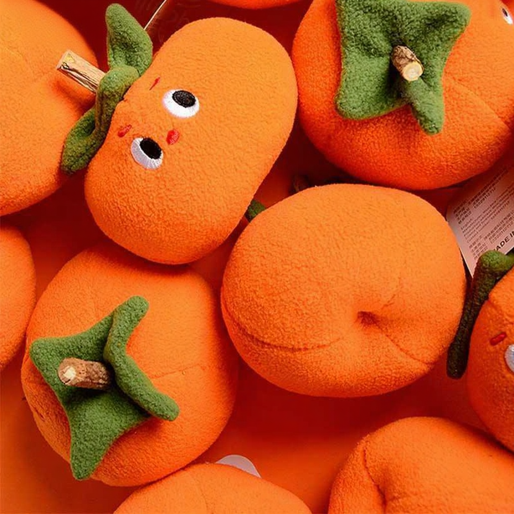 Catvera Orange Persimmon Dental Chew Toys - Image 4|||PROMPT|||Cleaned image. Original analysis: Found 1 watermark/brand text in the upper left corner of the image
