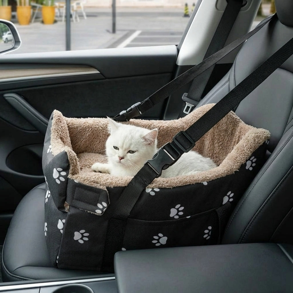 Catvera Oxford Travel Pet Bed - Travel Safety Features|||PROMPT|||Close-up shot of the adjustable safety straps securing a small white cat in the travel bed inside a car, showing the secure attachment mechanism and the cat's calm, relaxed expression, modern car interior visible with safety focus