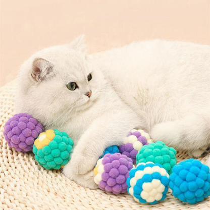 Catvera Plush Bell Cat Balls - Image 1|||PROMPT|||Cleaned image. Original analysis: found 1 text watermark 'MEWCATS' in the top left corner