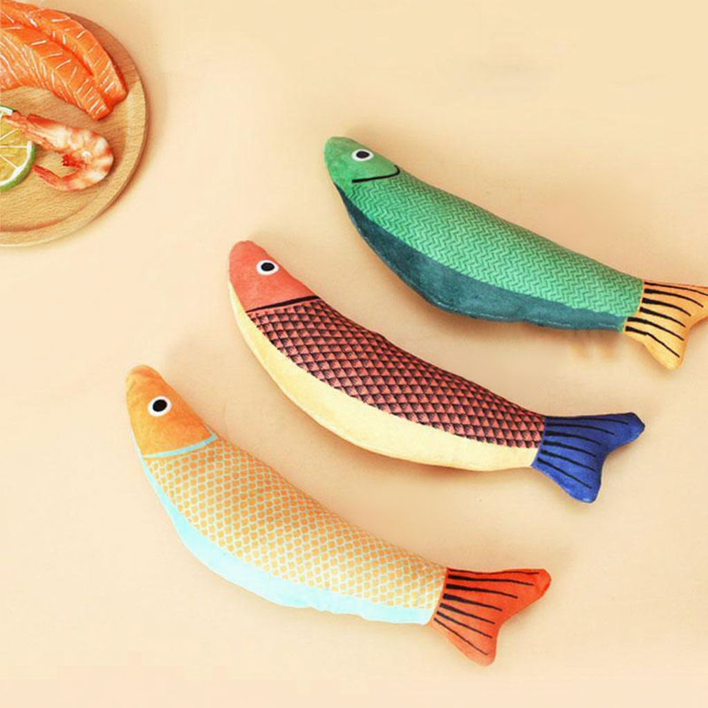 Catvera Plush Catnip Fish Toy - Image 13|||PROMPT|||Cleaned image. Original analysis: Found white label tags with brand information attached to each of the three decorative fish plushies