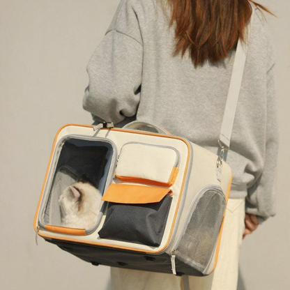 Catvera Rolling Wheeled Cat Carrier - Image 5|||PROMPT|||Cleaned image. Original analysis: Found 1 brand logo on the pet carrier. There is a small brand emblem/logo visible on the front of the cream and orange pet carrier bag.