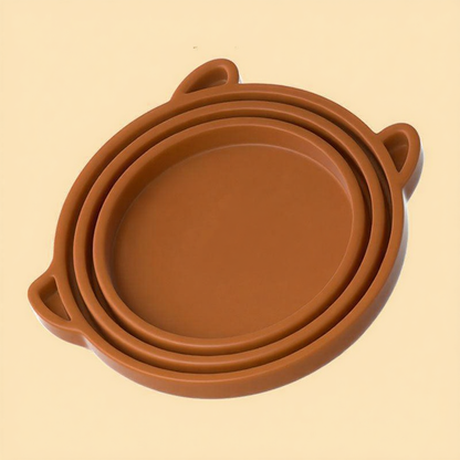 Catvera Silicone Pet Food Can Cover - Image 10|||PROMPT|||Cleaned image. Original analysis: found 1 brand name watermark on the product - partial text 'S' visible at bottom right corner of the image