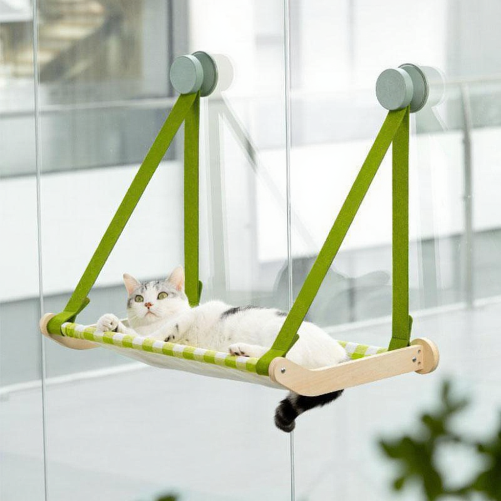 Catvera Suction Cup Window Cat Hammock - Image 11|||PROMPT|||Cleaned image. Original analysis: found 1 brand name/logo stitched on the product - orange rectangular patch with branding on the green strap