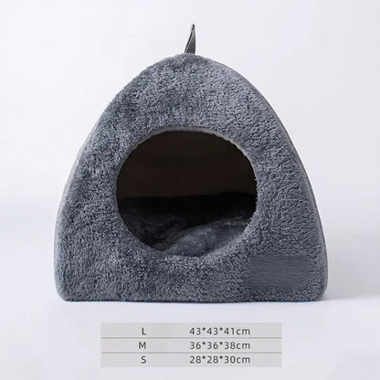 Catvera Triangle Enclosed Cat Nest - Image 6|||PROMPT|||Cleaned image. Original analysis: Found 1 brand name/logo patch on the product - a tan/beige colored label patch visible on the lower right side of the pet bed