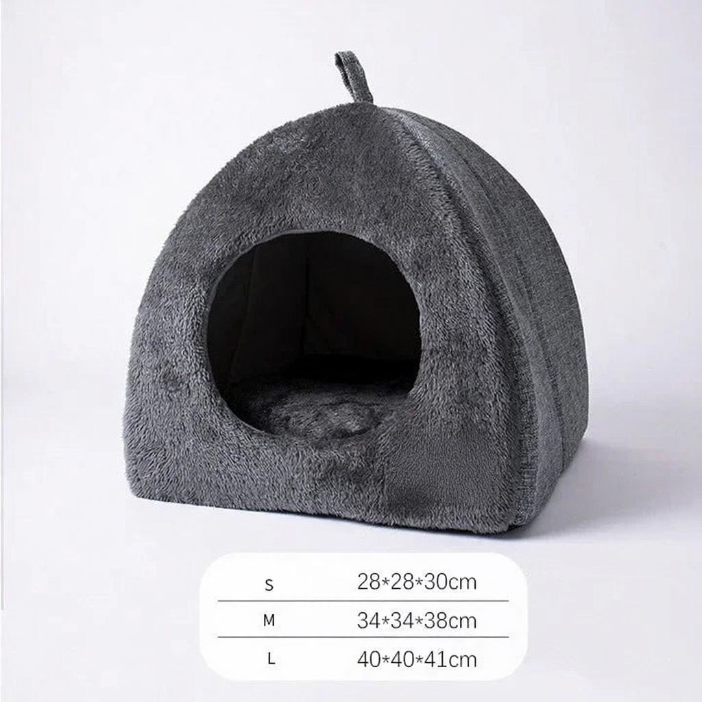 Catvera Triangle Enclosed Cat Nest - Image 7|||PROMPT|||Cleaned image. Original analysis: Found 1 brand logo patch on the product itself - a brown/tan rectangular 'Cat' brand label stitched onto the lower right side of the cat bed