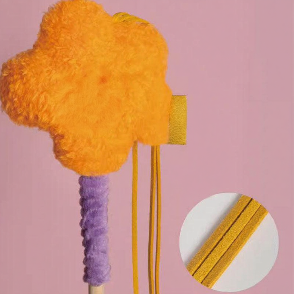 Catvera Wooden Bell Cat Stick - Image 7|||PROMPT|||Cleaned image. Original analysis: Found 1 caution/instruction label tag attached to the product with brand logo/text, and 1 brand name visible on the wooden stick handle