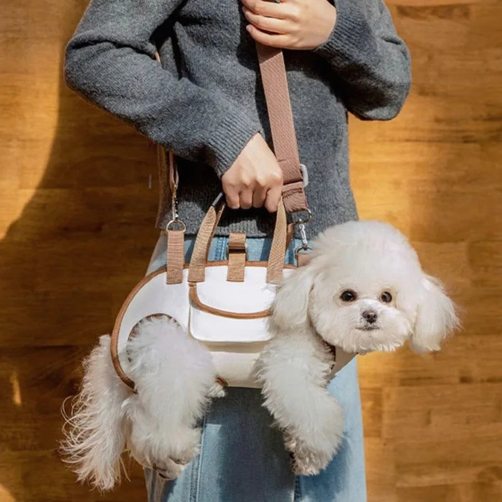 Horizontal Dog Carrier Crossbody Backpack - Image 2|||PROMPT|||Cleaned image. Original analysis: Found 1 brand name printed on the pet carrier bag