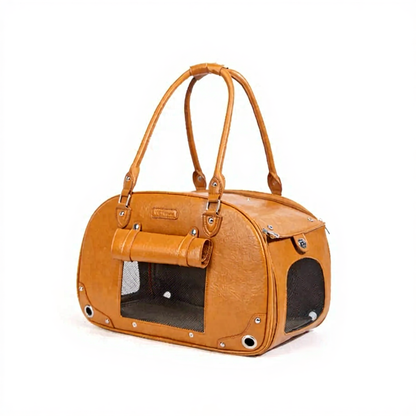 Stylish Travel Pet Carrier Bag - Image 6|||PROMPT|||Cleaned image. Original analysis: Found a brand name/logo embossed or printed on the leather bag surface near the top center area